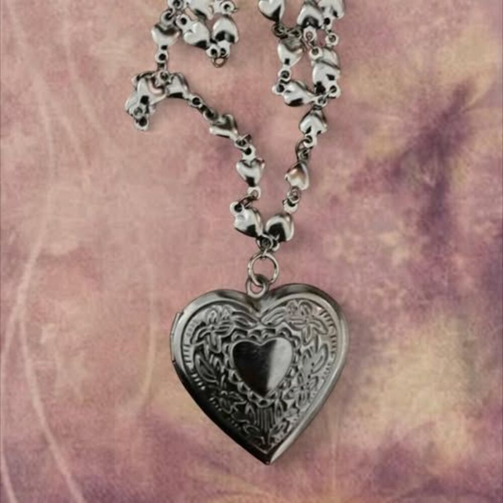 whimsical y2k style silver heart locket necklace with lobster clasp